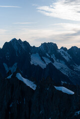 Mountain range in snow in Alps in sunrise