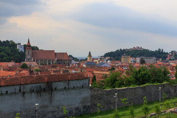 Fototapeta premium View from above of the Old Town of Brasov before the thunderstorm. Romania
