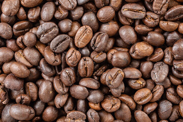 Fresh roasted brown coffee beans background