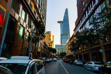 colorful street perspective in Ho Chi Minh City overlooking the Bitexco financial tower