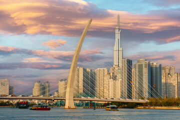 Beautiful sunset at 81 Ho Chi Minh Landmarks, the tallest building in Vietnam and the Cau Ba Son Bridge