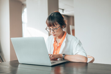 Woman typing laptop keyboard. woman working with laptop.