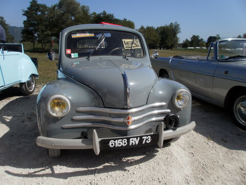 Le Bourget du lac, France - August 19th 2012 : Public exhibition of classic cars. Focus on a green Renault 4CV.