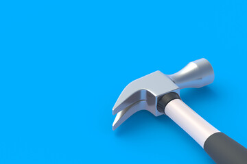 Hammer on blue background. Construction concept. Home renovation. Tools for repair. Copy space. 3d render