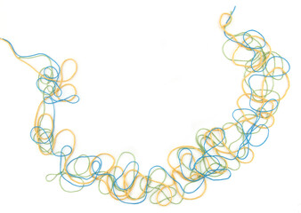 Tangled colorful cotton threads isolated on white background. Abstract thread lines pattern.
