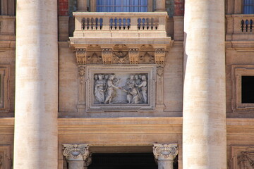 St. Peter's Basilica Facade Detail with Balcony, Columns and Relief in Rome, Italy © Monica