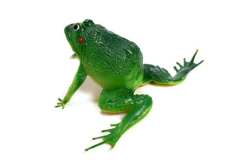 toy green frog isolated on white background