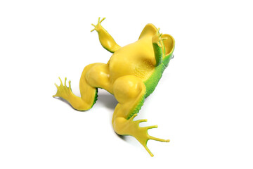 Fototapeta na wymiar upside down toy frog isolated on white