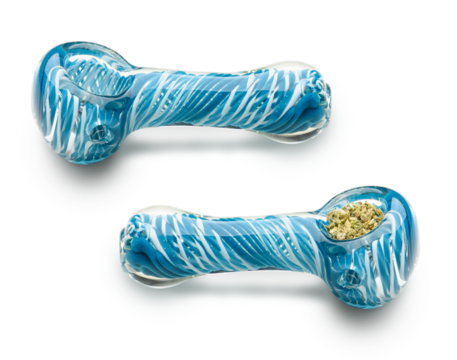 Cannabis in glass pipe. Isolated on white background