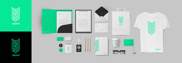 Green corporate identity template design with color geometric elements in digital style. Full starter pack of stationery design with folder and business cards, letterhead and envelope
