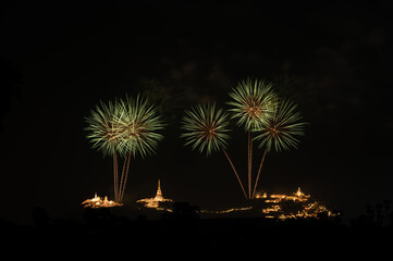 Fireworks above the mountain with the ancient royal palace known as 