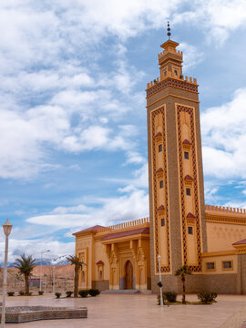 Large Mosque in Midelt located in the High Atlas, Morocco, with snowcapped mountains in the background