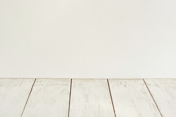 Background of aged white painted wooden planks  and pure white blank background close-up.