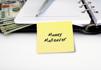 Pen notebook cash dollar money on white background with notepad written MONEY MAKEOVER - to...