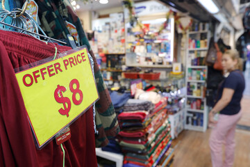 Daily life. Discount in a shop. Singapore.