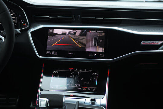 Belarus, Minsk - 24.01.2023: Interior of premium car Audi RS 7 Sportback. Interior of premium car with rearview camera dynamic trajectory turning lines and parking assistant steering wheel.