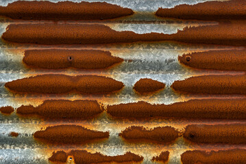 Rusty corrugated sheet metal background texture