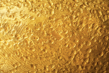 Golden wall concrete texture rough. Beautiful patterned gold wall texture background pattern. abstract background concept