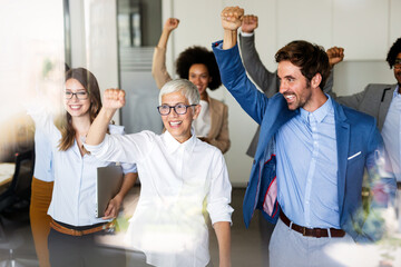 Obraz premium Success group of multiethnic entrepreneurs and business people achieving goals in corporate office