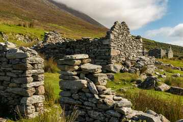 Ruins of the houses of Slievemore Deserted Village on Achill Island, near Keel, County Mayo, Ireland