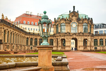 An old Baroque street lamp illuminating the palace grounds