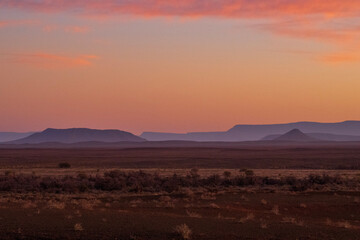 Toward the Roggeveld mountain range. A sunset over the desert of the Tankwa-Karoo National Park. Tankwa means turbid water or thirst land and the park is situated in the succulent Karoo biome.
