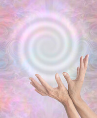 Healer Sensing High Vibrational  Healing Vortex -  female hands with wide fingers on the edge of a...