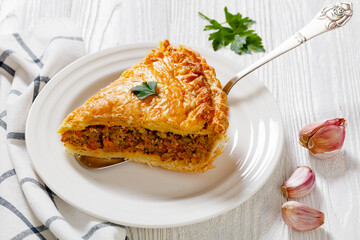 Ground Beef Meat Pie on white wooden table