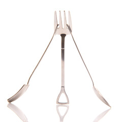 decorative fork and spoons in the form of spades on a white background. food tools.