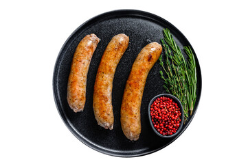 Sausages fried with spices and herbs on a plate.  Isolated, transparent background.