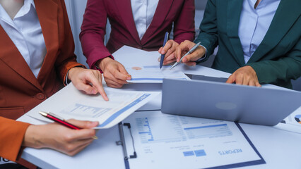 small business accounting team meeting three asian people with salary monthly charts data, basic business accounting and bookkeeping concept.