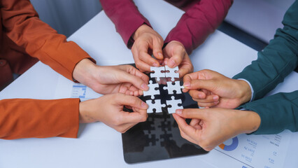 join hands jigsaw puzzle teamwork concept. small business accounting team meeting three asian people with salary monthly charts data, basic business accounting and bookkeeping concept.