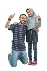 happy excited young father with her daughter smiling to camera