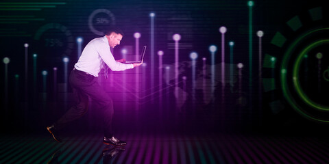 Fototapeta na wymiar Businessman with laptop running with technology background