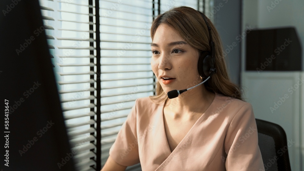 Aufkleber competent female operator working on computer and while talking with clients. concept relevant to bo