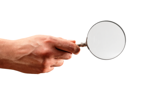 Hand holding metal magnifying glass isolated on white background