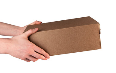 Hand holding cardboard box, giving carton package isolated on white