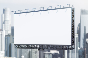 Blank white horizontal billboard on city buildings background at daytime, perspective view. Mockup, advertising concept