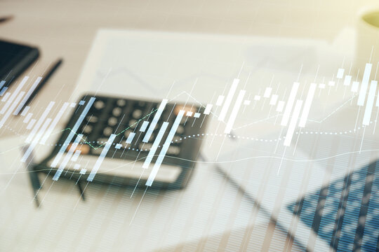 Multi exposure of virtual abstract financial diagram on calculator and pc background, banking and accounting concept