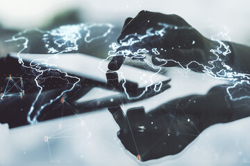 Double exposure of abstract digital world map and finger clicks on a digital tablet on background, big data and blockchain concept