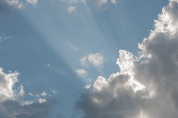 Fototapeta na wymiar celestial sun rays and stormy clouds