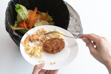 people put bio trash from food waste in domestic homes to compost bins to make fertilizer to reduce global environmental pollution.