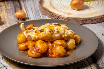 Traditional greek stifado with cod fish