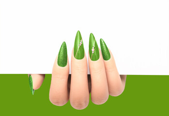 Female hand wih perfect stiletto manicure holding white paper. Template for postcard or advertising...
