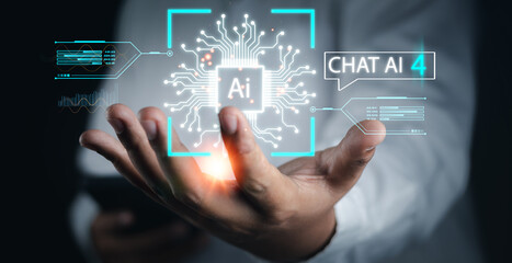 Digital chatbot,Ai tech,robot application,conversation assistant,Businessman holding virtual graphic Global Internet connect Chatbot Chat with AI.Artificial Intelligence software automation technology