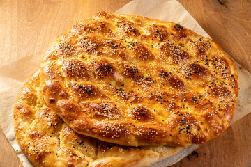 homemade pizza on wooden board, ramadan pita