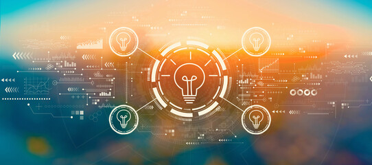 Obraz premium Idea light bulb theme with blurred cityscape at sunset or sunrise