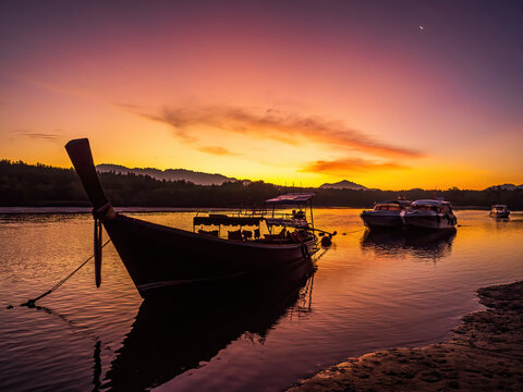 Parked fishing boat fishing jetty sunrise
