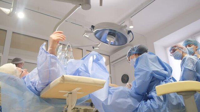 Medical Students Practice Surgery In A Real Operation In A Hospital. Training To Be A Doctor