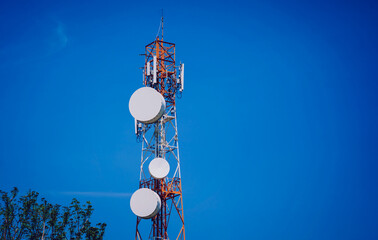 5G Cell Towers for smart mobile telephone on sky background